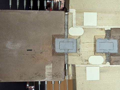 Part of a parking garage wall that looks like a modern abstract painting