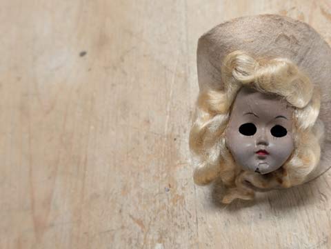 An old Sally Starr doll head with it's eyes missing